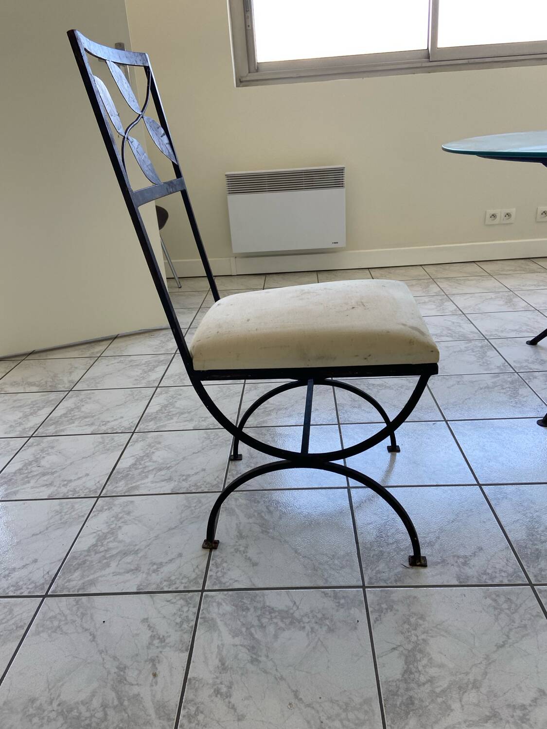 green table on wrought iron legs + 6 matching chairs