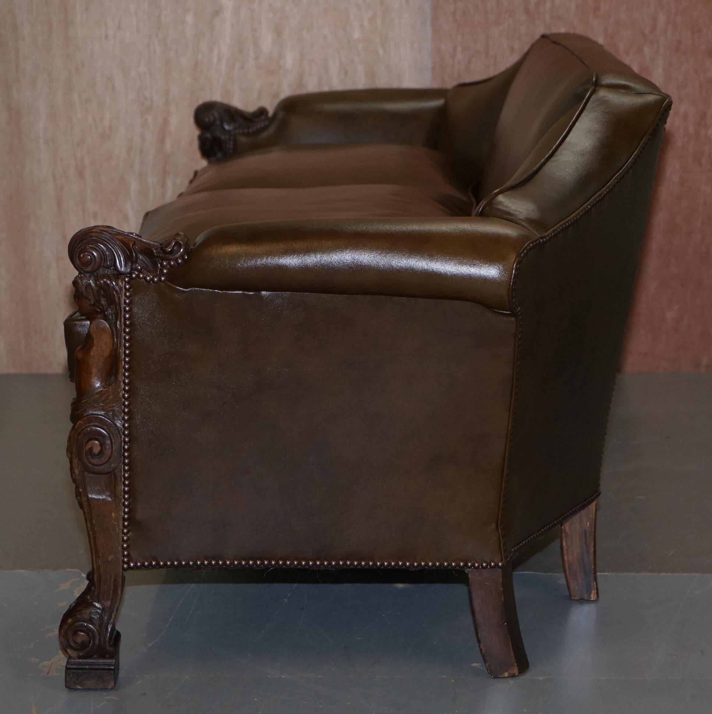 Restored Regency canapé in leather with sculpted Hermès frame.