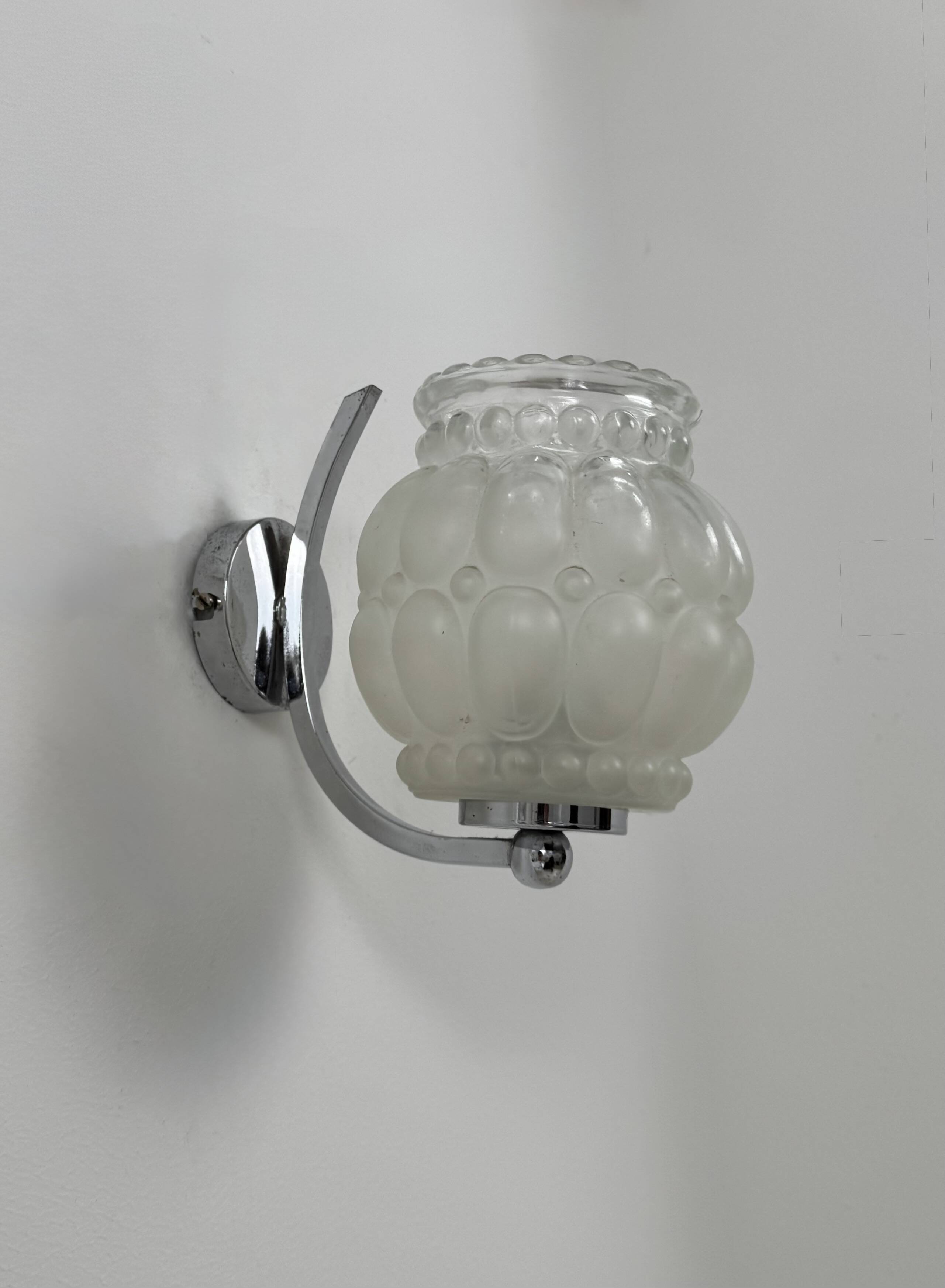 Pair of vintage chrome metal and bubble glass wall lights, France, 1950.