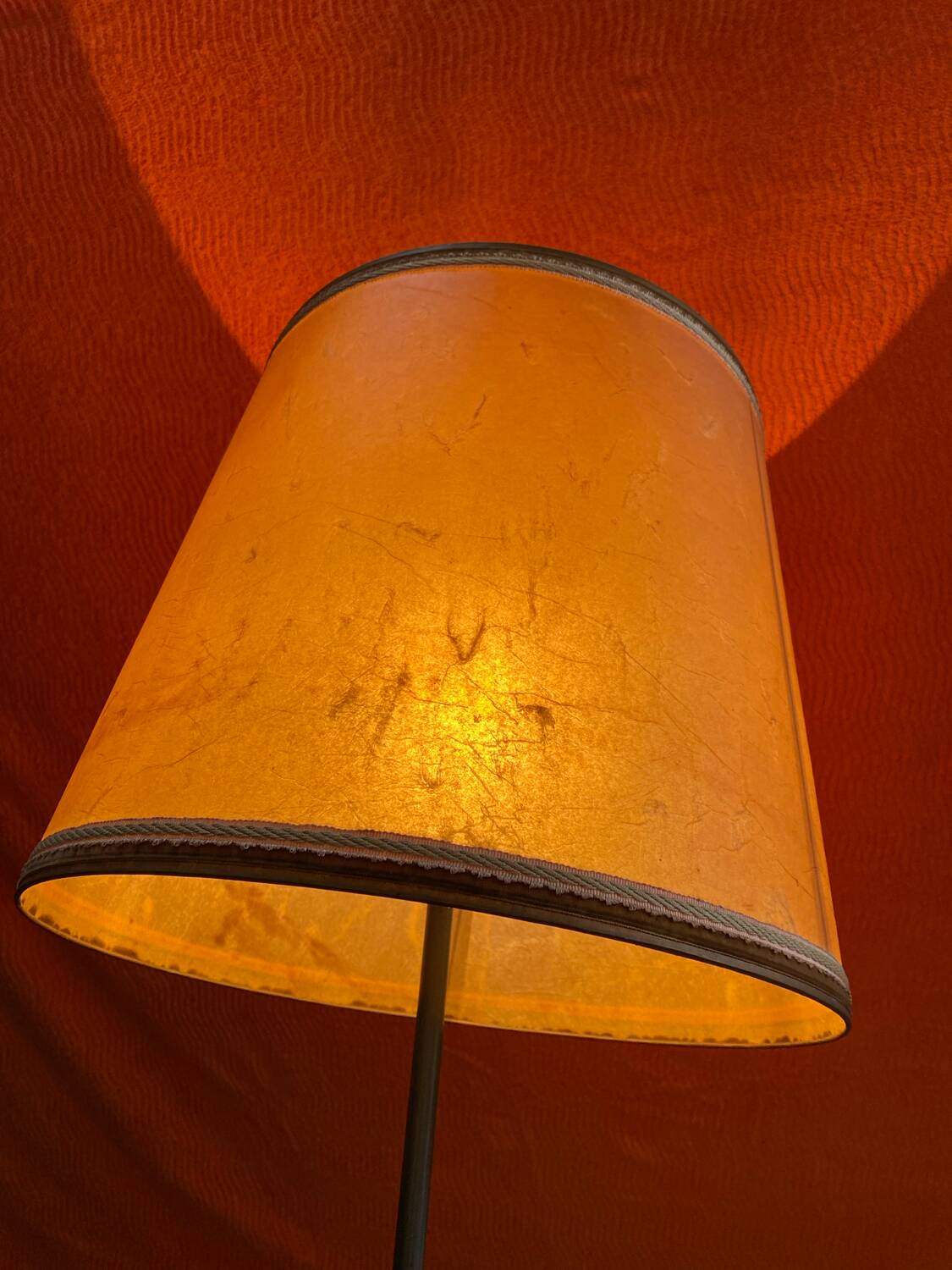 Vintage 1960s floor lamp with black tripod base and round varnished wooden shelf