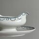 Antique porcelain sauceboat with tray