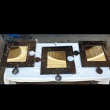 Triptych puzzle mirror in raw varnished metal