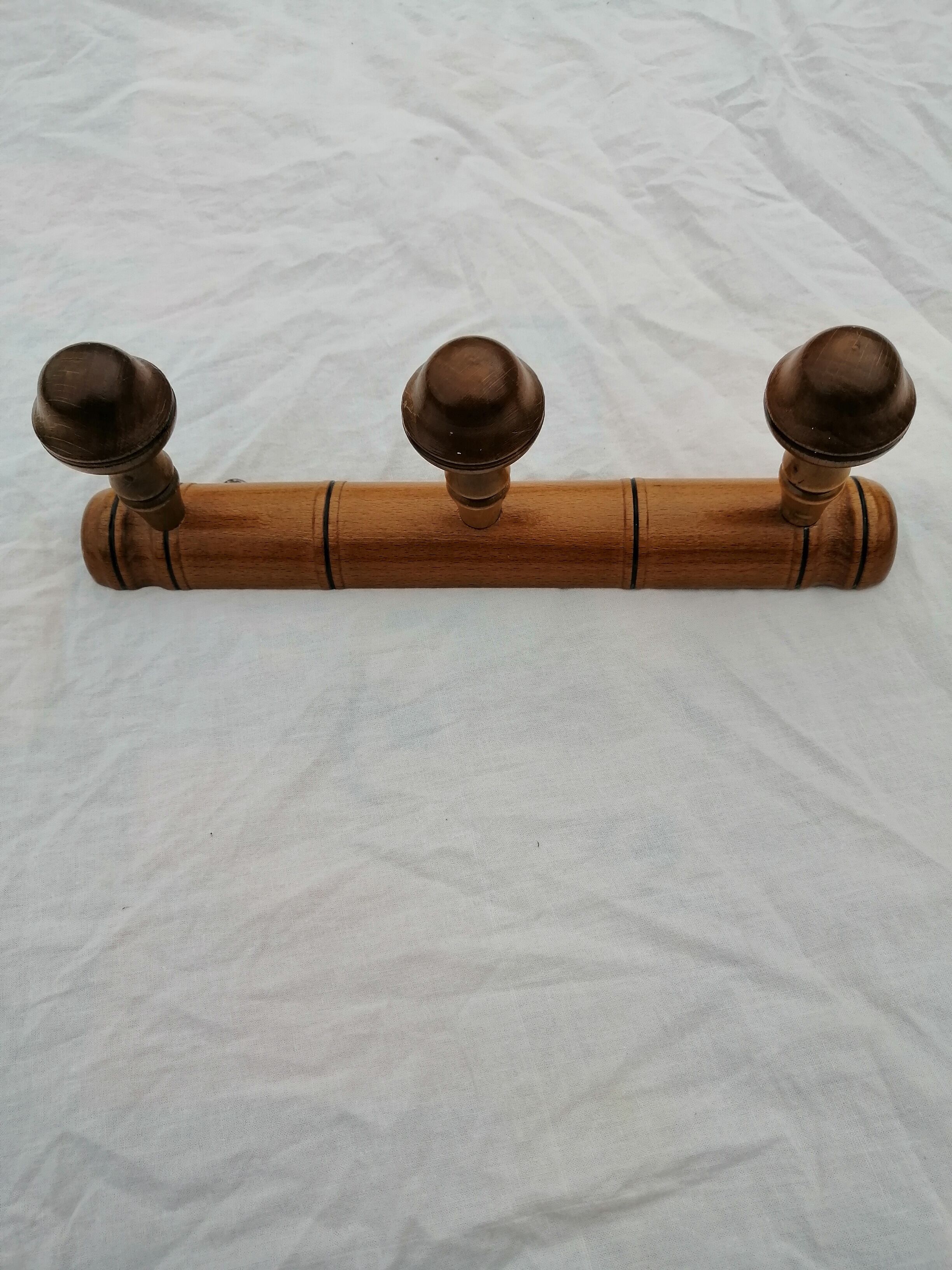 Wooden wall coat rack