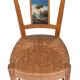 Pair of chairs with barrette backs and bands painted with animated landscapes