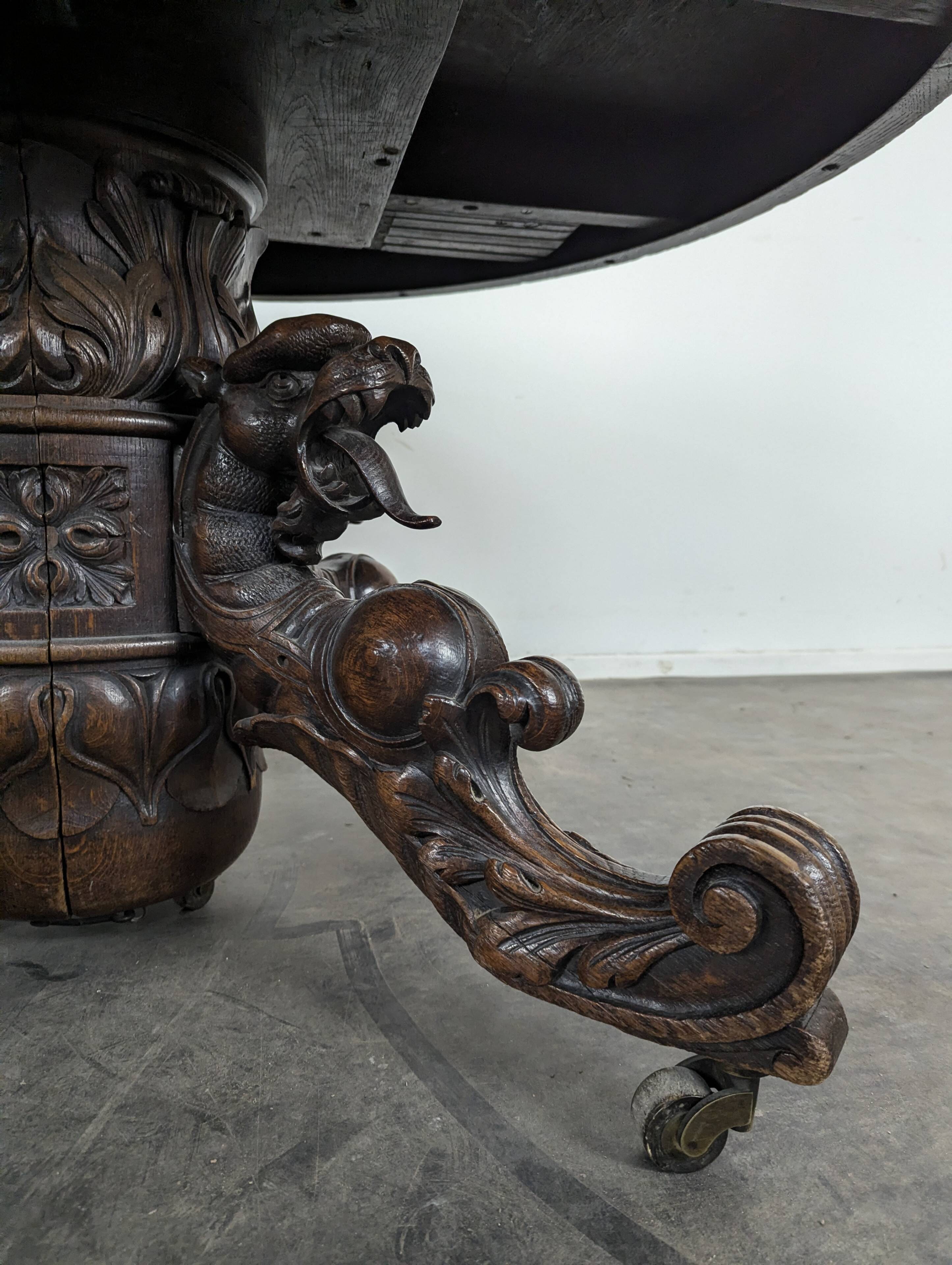 Renaissance-style gueridon with dragon heads in oak