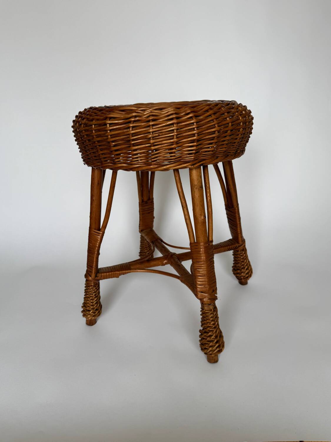 Vintage Mid Century Modern handwoven wicker stool