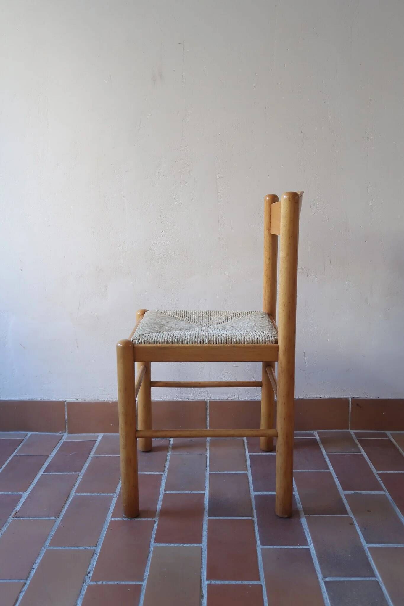 4 solid pine chairs, straw seats, shaped backrest.