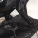 Large animal sculpture representing a roaring panther, signed BE.