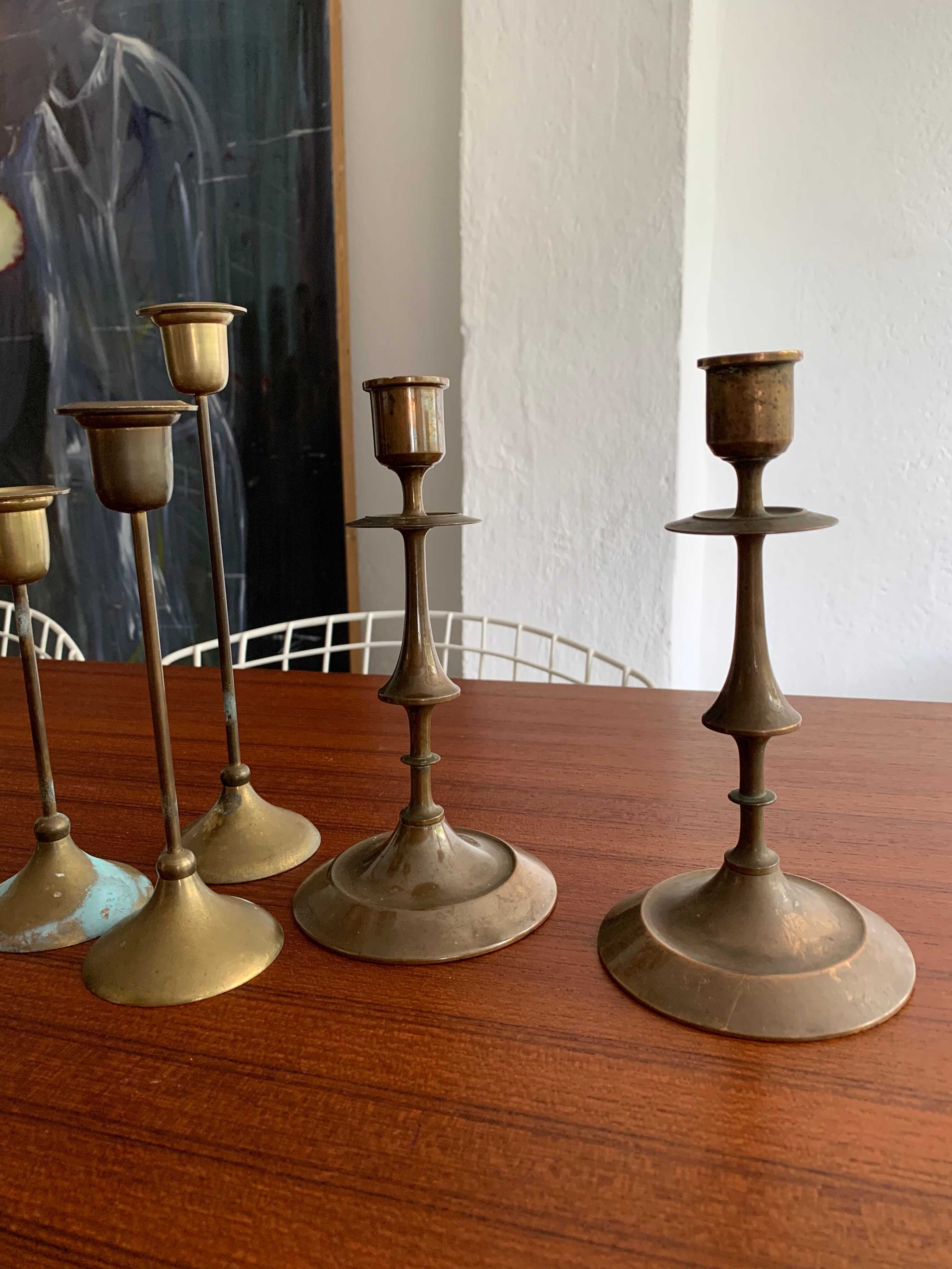 Set 7 mismatched brass and bronze candlesticks