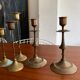 Set 7 mismatched brass and bronze candlesticks