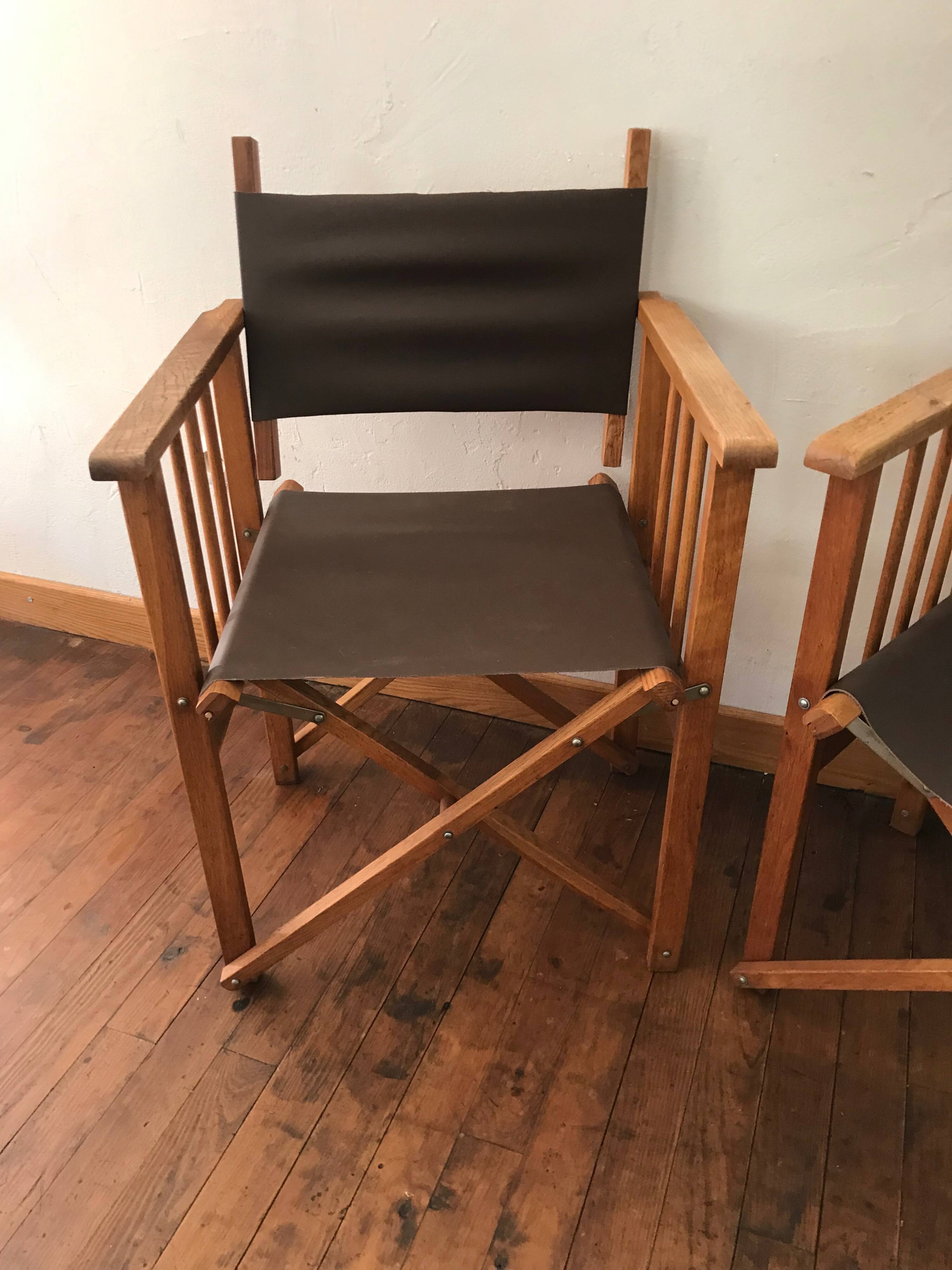 pair of Safari armchairs in wood and leather