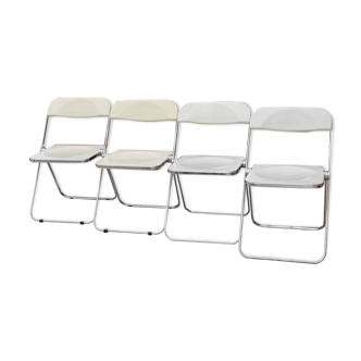 Series of 4 white Plia Castelli chairs