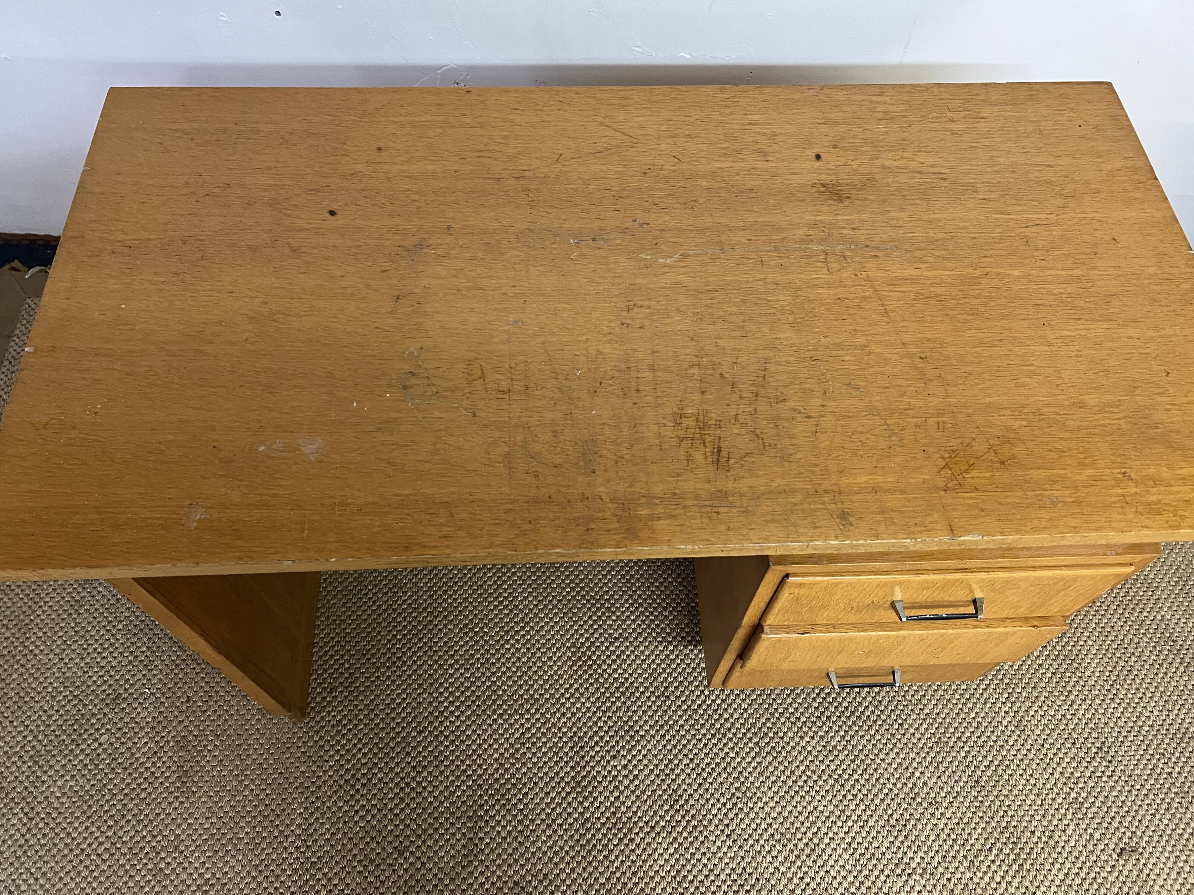 Old wooden desk and armchair