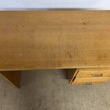 Old wooden desk and armchair