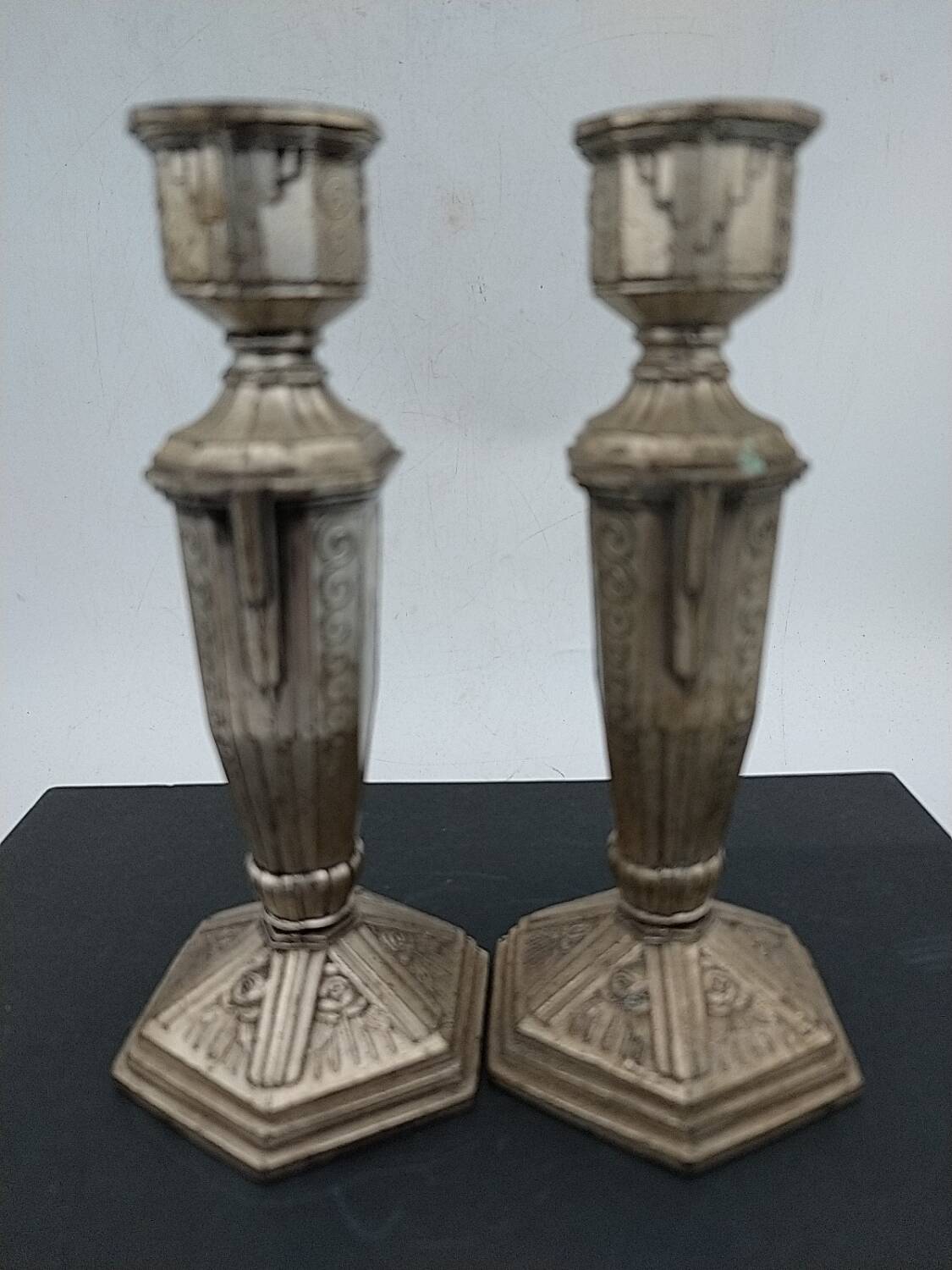 Art Deco metal candle holders.