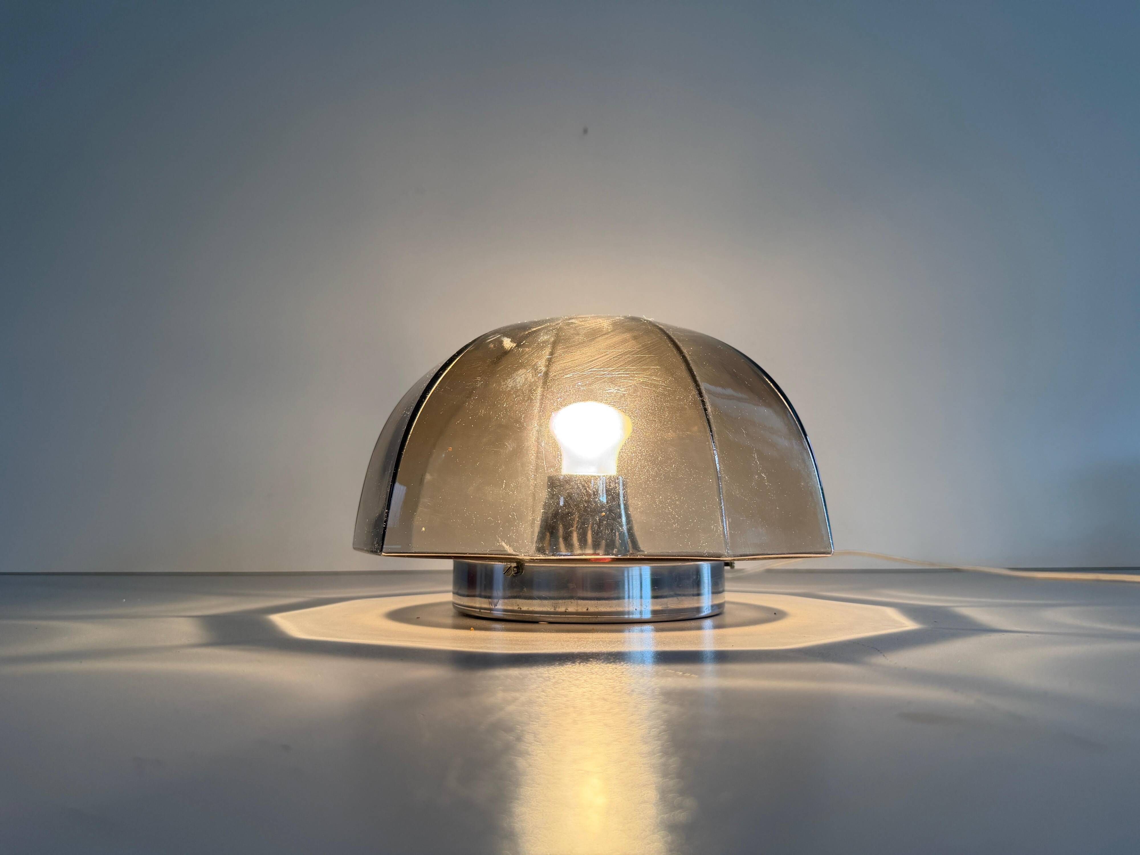 Flush-mounted brown glass fixture and metal base by N Leuchten, 1960s, Germany.