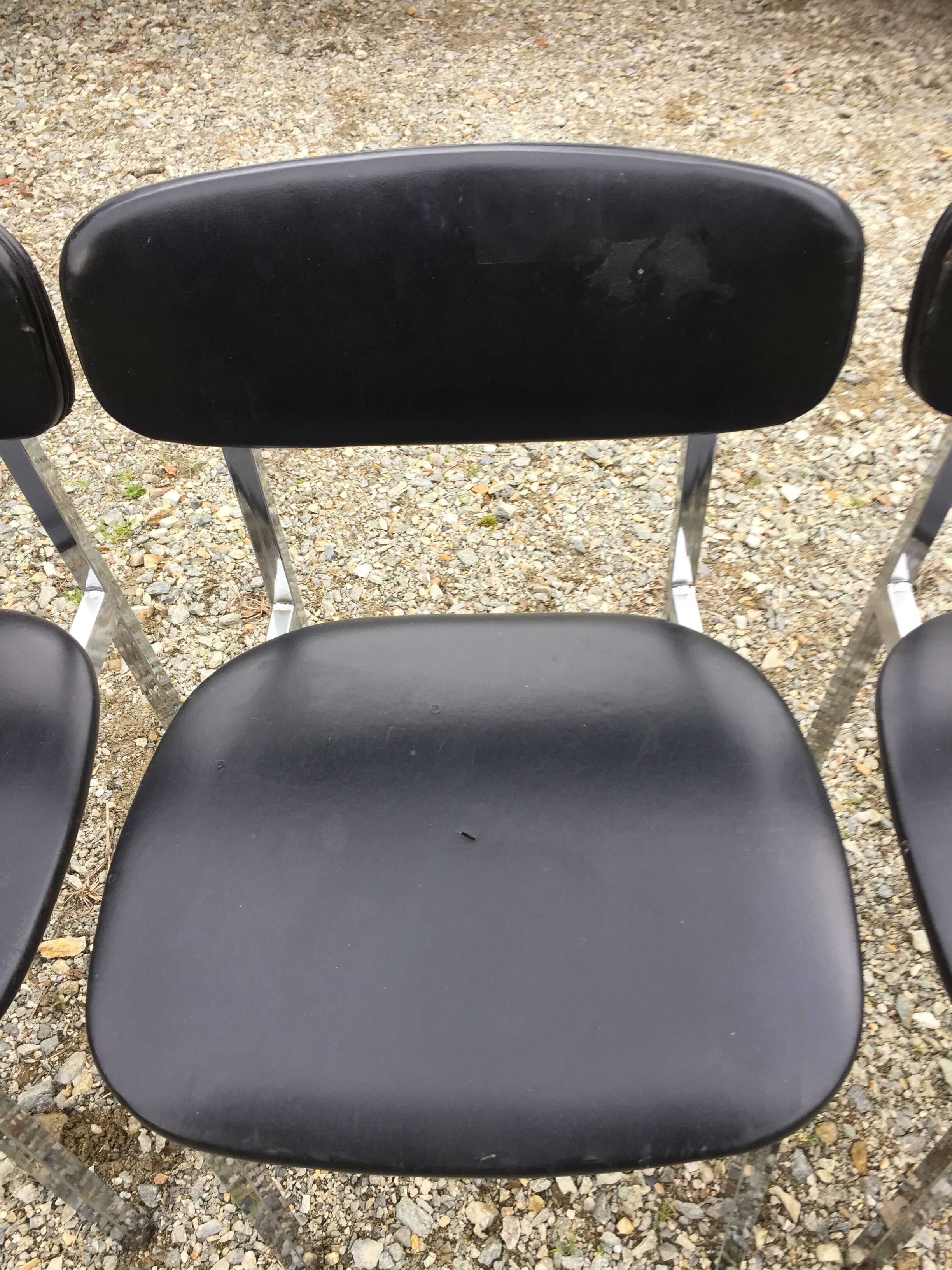 6 vintage chairs in black skaï with chrome metal tubular base.