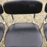 6 vintage chairs in black skaï with chrome metal tubular base.