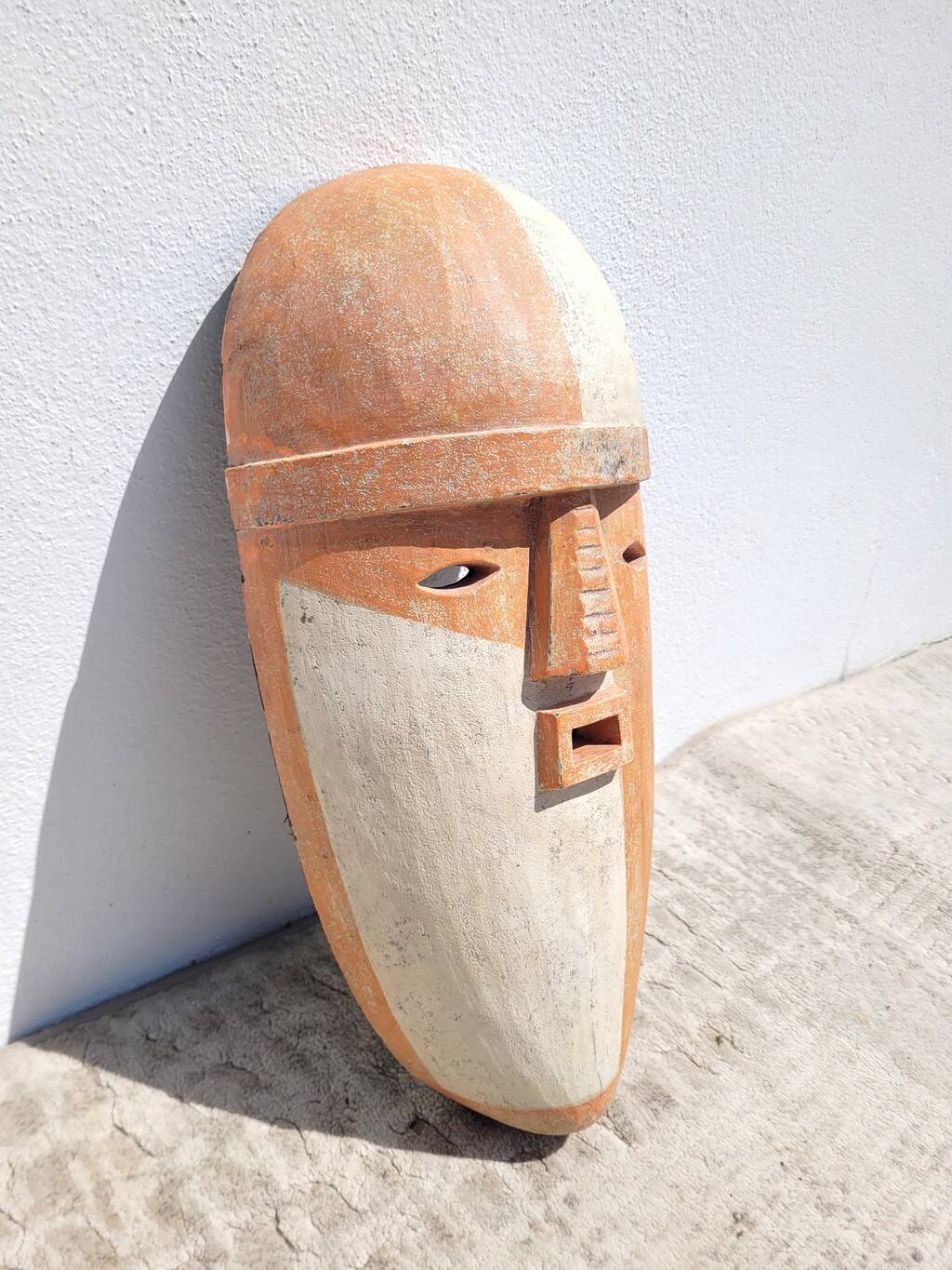Wooden mask in the spirit of Adouma