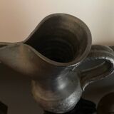 Black ceramic pitcher by Jean Marais
