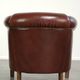 Sheepskin club armchair in English style with brown colour scheme