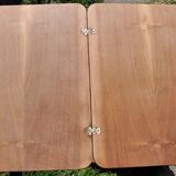 Table basse à plateau pivotant