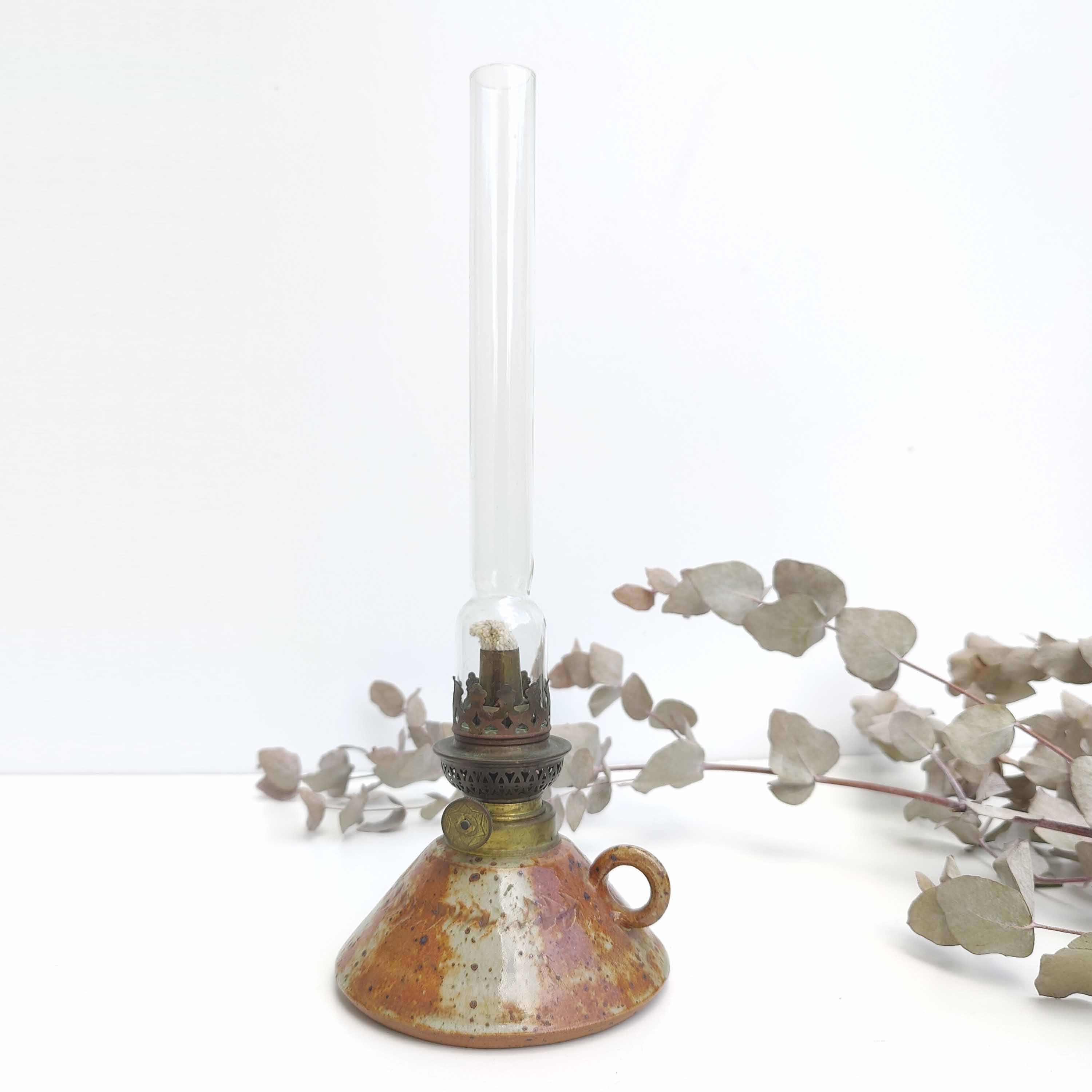 Oil lamp sandstone signed