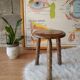 Old farm stool, wooden tripod campaign