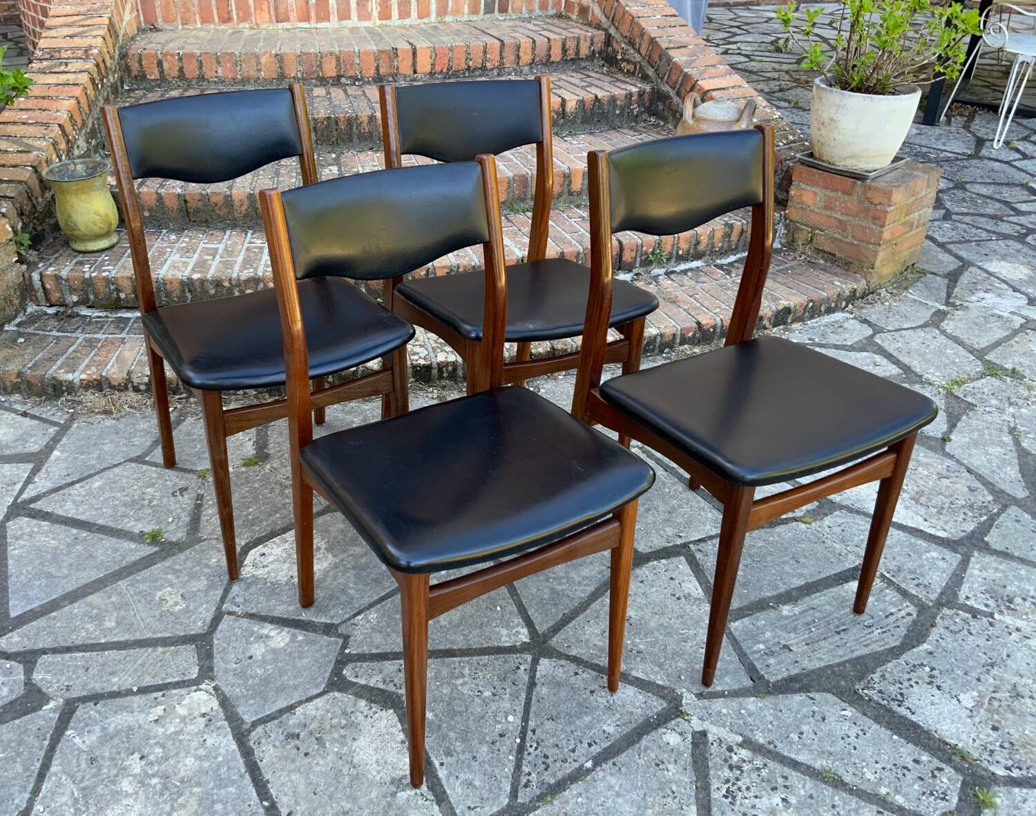 4 Scandinavian black leatherette chairs