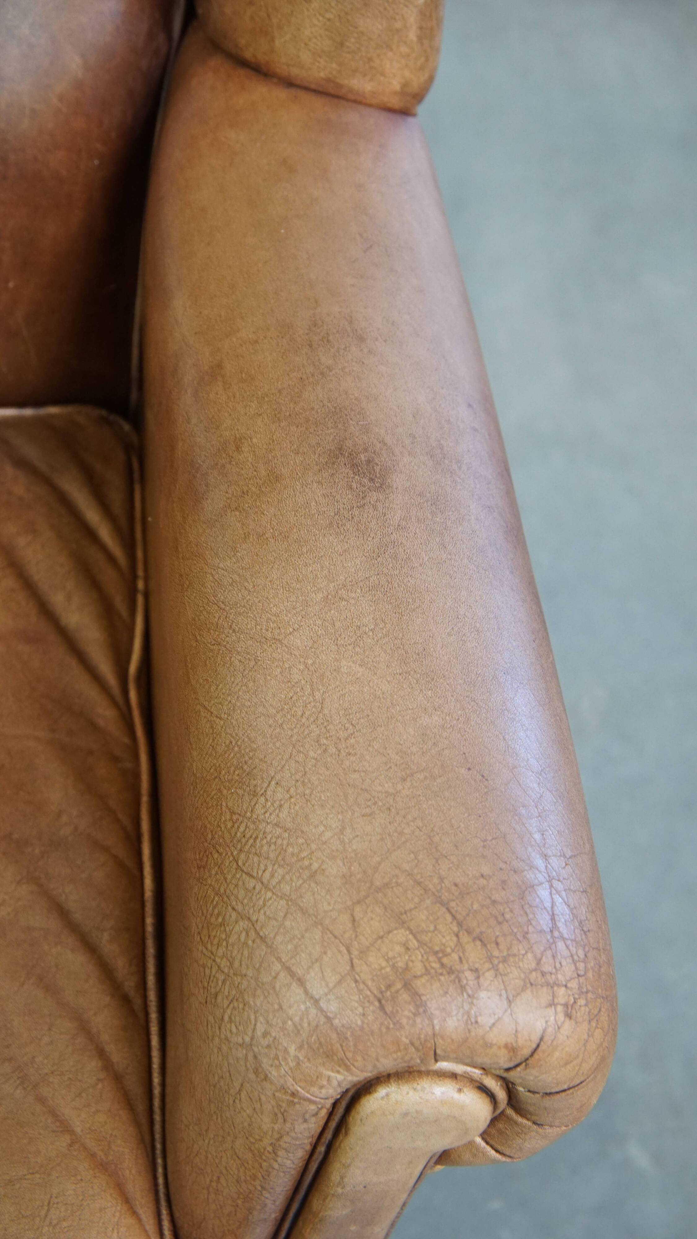 Cowhide Leather Wingback Chair in Light Cognac Color