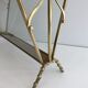 Bamboo-style brass magazine rack from the Baguès house.