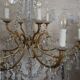 Chandelier 12 lamps with grapevines in crystal, bronze and regulated