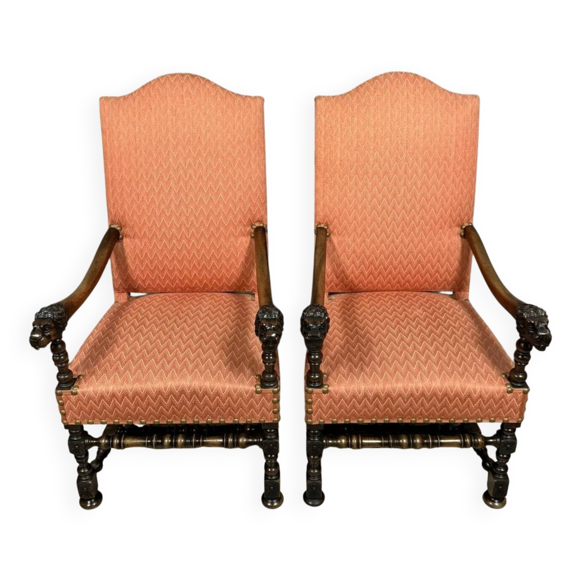 Pair of Louis XIII style armchairs in carved walnut circa 1850