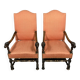 Pair of Louis XIII style armchairs in carved walnut circa 1850
