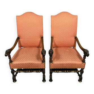 Pair of Louis XIII style armchairs in carved walnut circa 1850