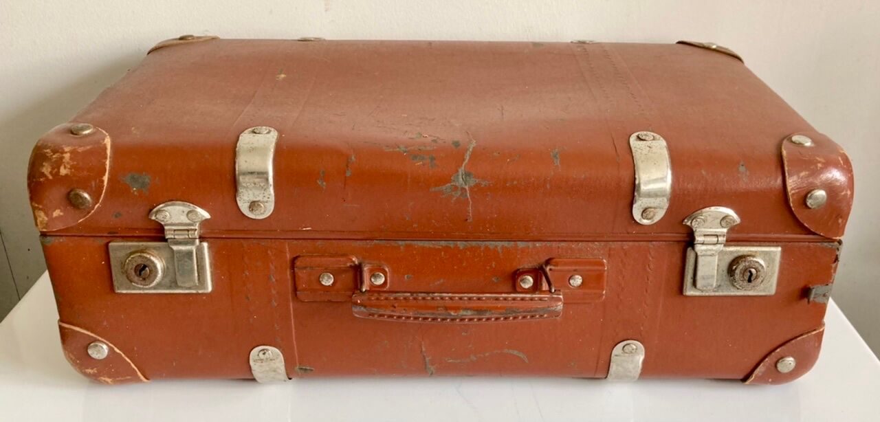 Small old brown suitcase