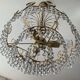 Brass chandelier with crystal pendants from the 1970s.