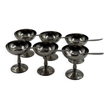 Set of six stainless steel dessert bowls with matching spoons.