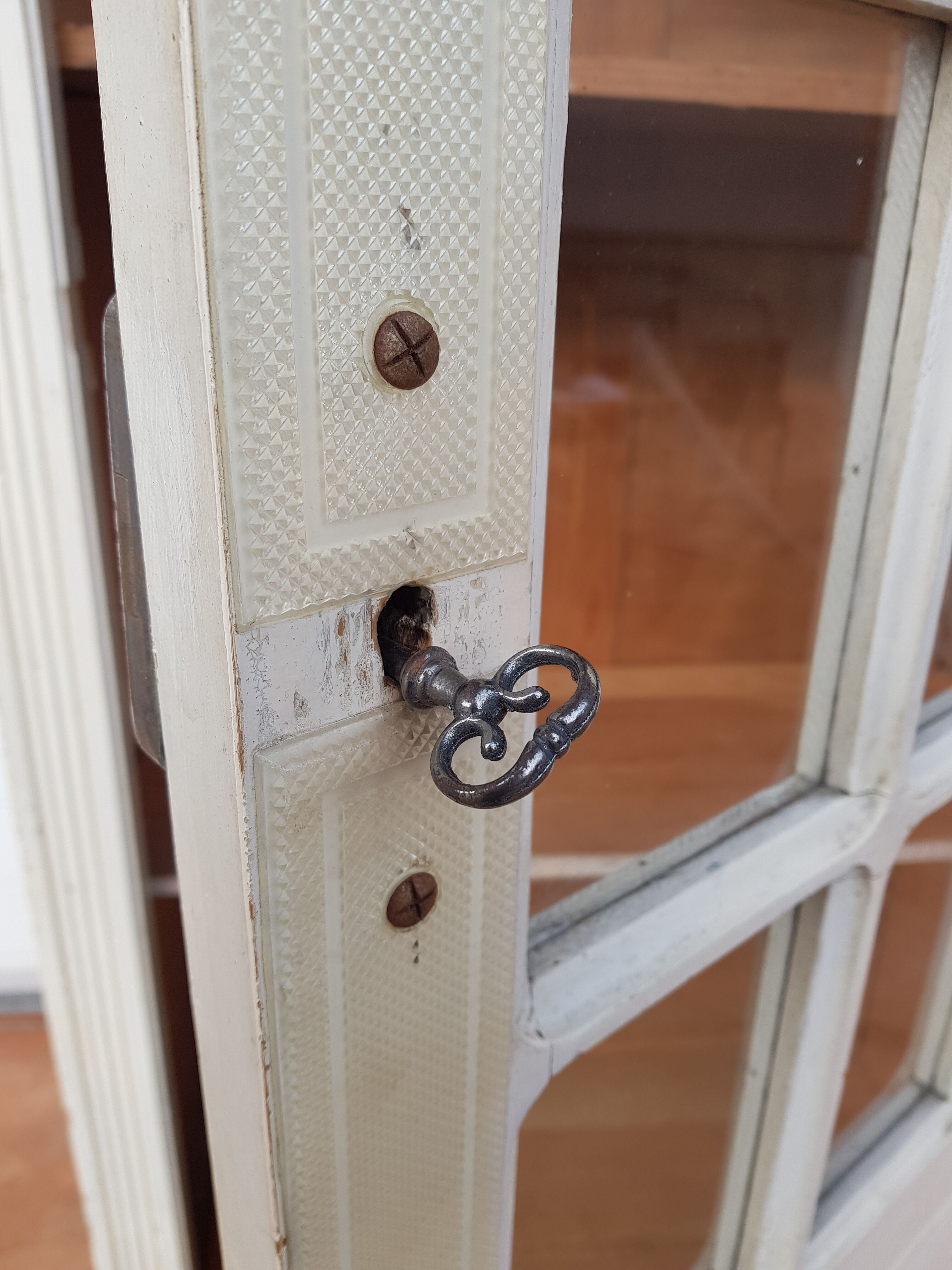 Old cabinet at the beginning of 20th Century glass