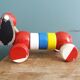 Lacquered wooden pull-along dog toy