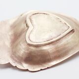 Empty brass heart pocket