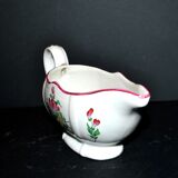 Lunéville KG earthenware sauce boat with polychrome painted flowers, revolving lamp.