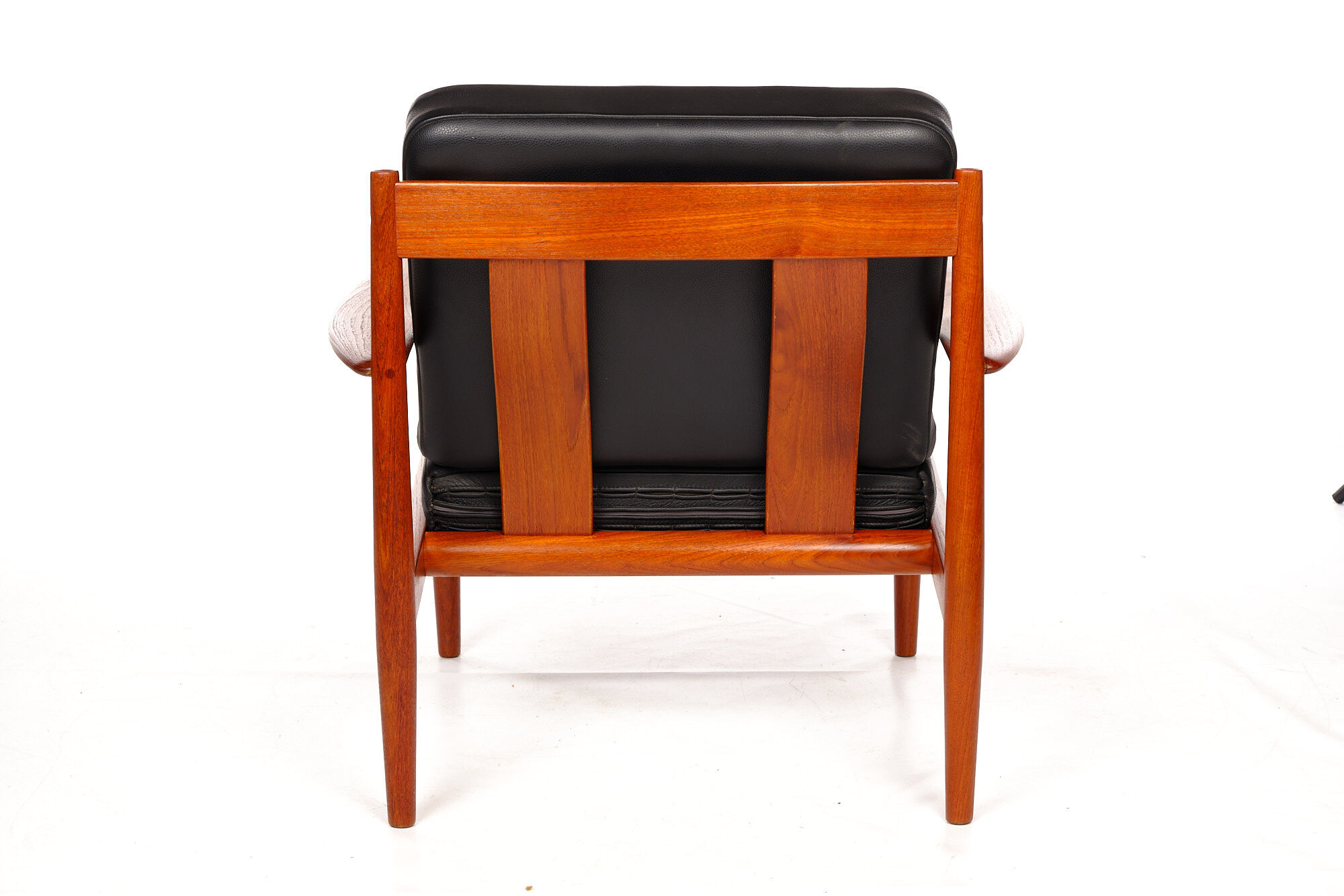 Armchair by Grete Jalk, France Son, cowhide leather and vintage teak from the 1960s
