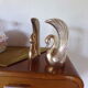 Pair of greenhouse books brass swans