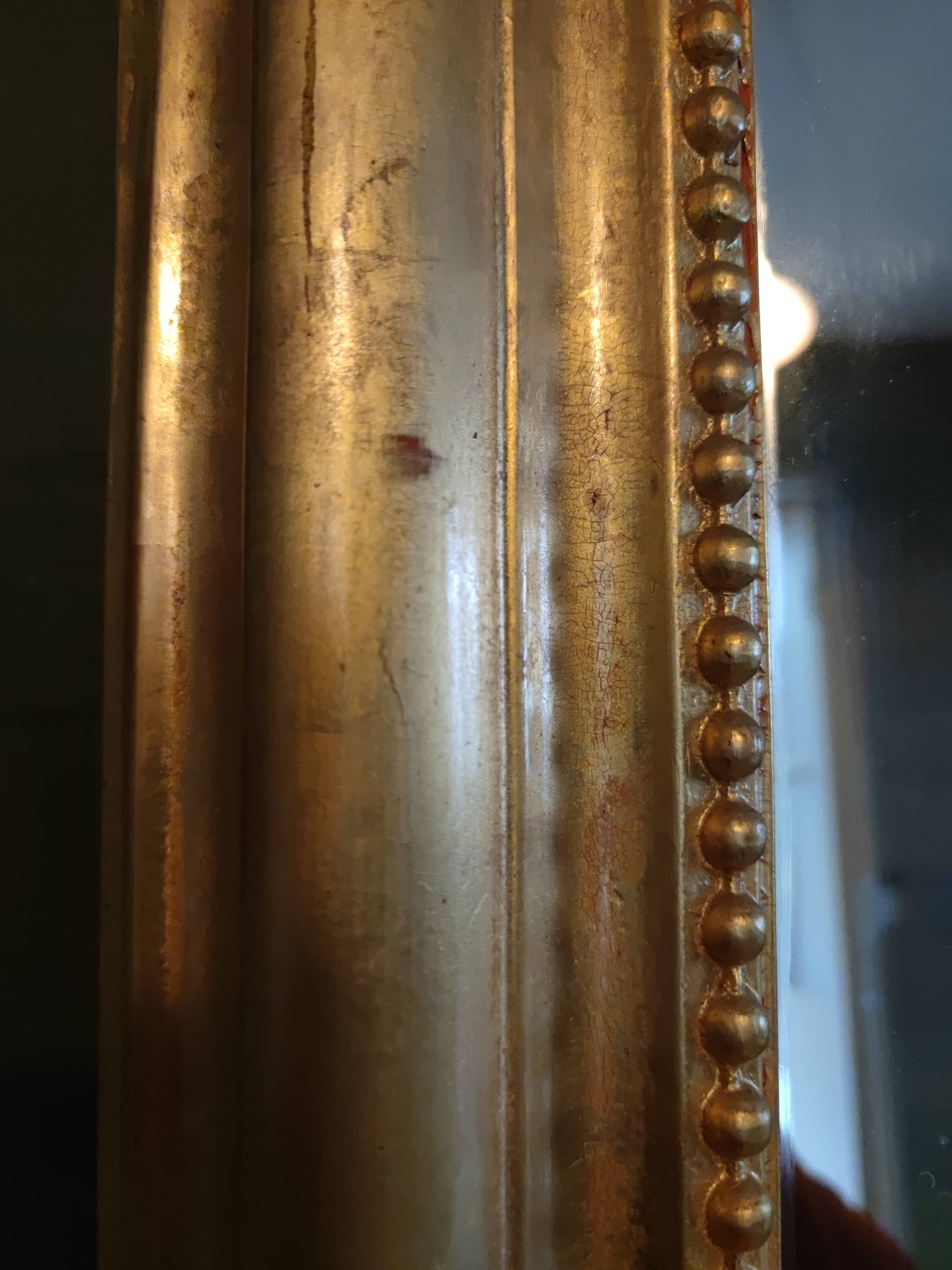 Louis Philippe pearl-gilded mirror in gold leaf, 133/177cm