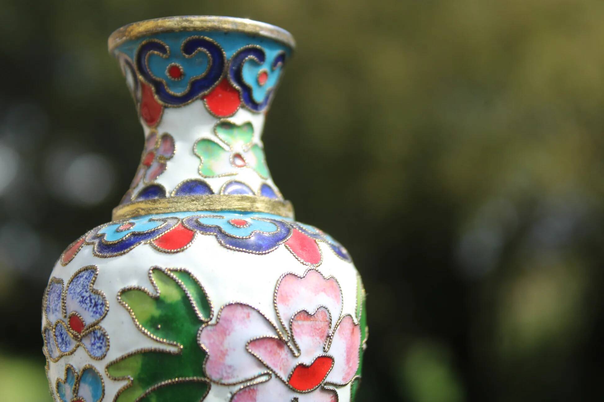 Two small vintage cloisonné enamel vases with Asian floral decoration.