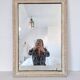 Miroir rectangle en bois et sculpté en bas-reliefs