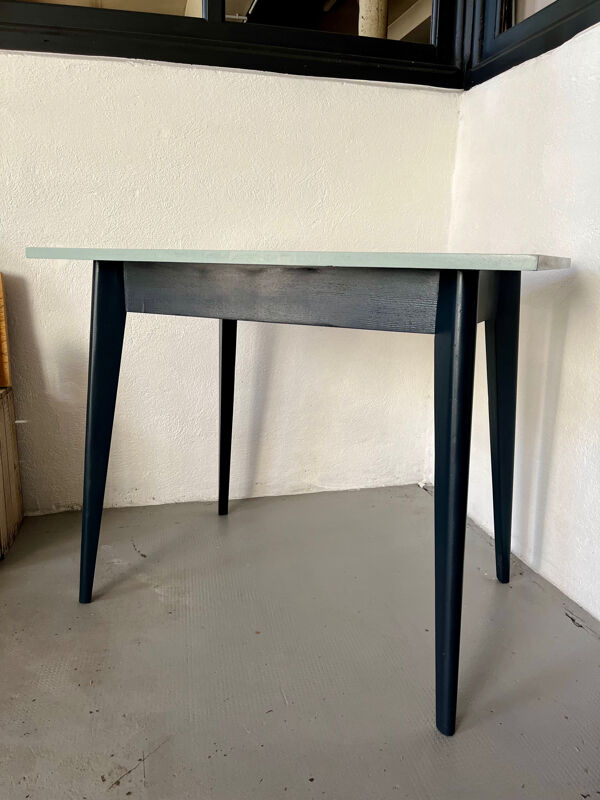 Table pieds compas