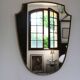 Brass mirror with crest, bead frieze, Italian design style.