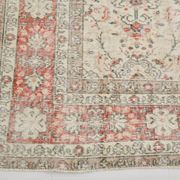 Tapis persan vintage à motif floral